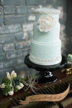 a wedding cake sitting on top of a table