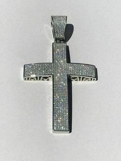 "Gorgeous solid 925 silver men's cross This is a BIG piece!! Measures roughly 3.25\" by 2.25\" (4\" with bale) weighs a solid 45 grams! Fits most Chains up to 14mm thick Nice heavy solid feel! Solid 925 sterling silver Will never change color or go green!! Great investment piece 2000 micro-paved simulated diamonds handset" Sterling Silver Cross Pendant, Silver Cross Pendant, Jewelry Images, Round Moissanite, Sterling Silver Cross, Cuban Chain, Silver Cross, Selling Jewelry, Silver Man