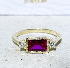 Don't miss this opportunity to own this beautiful gemstone ring crafted in 14k gold filled => Gemstone Type - Lab Grown Ruby, Clear Quartz => Gemstone Size - 5*7 mm, 2.25 mm => Gemstone Cut - Faceted => Metal Type - 14k Gold Filled (Tarnish Resistant And Nickel Free) - also available in 925 sterling silver ~ Please contact me for pricing on a sizes larger than 11 * ~Feel free to ask me about custom made designs. ❏ Replacements and custom orders : ✪ 925 sterling silver - no additional cost ✪ 14k Rectangular Birthstone Ring For Wedding, Rectangular Birthstone Wedding Ring, Fine Jewelry Ruby Rings With Rectangular Stone, Fine Jewelry Ruby Ring With Rectangular Stone, Rectangular Ruby Rings For Promise, Rectangular Ruby Promise Ring, Ruby Rings With Rectangular Gemstone, Ruby Gemstone Rings With Rectangular Stone, Ruby Ring With Rectangular Stone For Anniversary