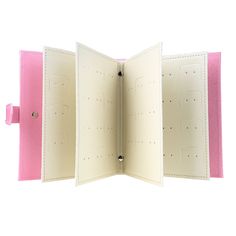 an open pink and white book on a white background