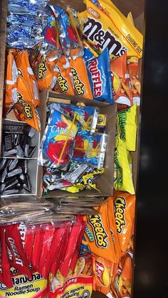 a box filled with assorted candy and candies