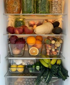 an open refrigerator filled with lots of different types of fruits and vegtables