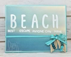 a card with the words beach written on it and a blue ribbon tied around it