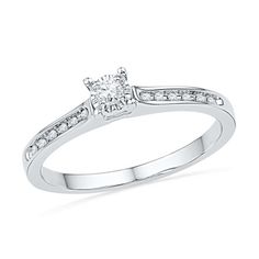 a white gold engagement ring with diamonds