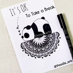 a drawing of a panda bear on top of a piece of paper with the words it's ok to take a break