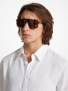 Our Murren sunglasses take an aviator-style approach to classic square pairs. They’re made from smooth tortoiseshell plastic decorated at the rims with our logo initials. Offering full UV protection, they’re a stylish option for the sunniest days. Michael Kors Aviator Sunglasses, Classic Square Frame Aviator Sunglasses For Summer, Classic Shield Sunglasses With Tinted Lenses For Summer, Classic Tinted Shield Sunglasses For Summer, Brown Casual Wayfarer Shield Sunglasses, Casual Brown Shield Sunglasses In Wayfarer Style, Summer Brown Wayfarer Shield Sunglasses, Modern Brown Shield Sunglasses For Vacation, Brown Shield Sunglasses For Summer