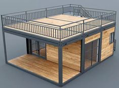 an image of a small house made out of wood and metal with a balcony on the top floor