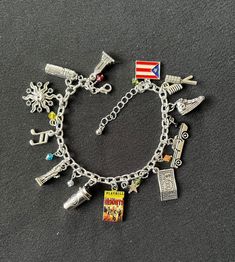 This bracelet makes a wonderful fashion statement!  Chain decorated with silver toned charms honoring the story.  Bracelet is 7.5 inches but adjustable up to 9 inches Add a gift box so your item arrives ready to give or can be shipped directly to recipient in box with a message! Theatre Boy Gifts, Theatre Jewelry, Tortured Poets Department Bracelet, Braces Humor, Adjustable Novelty Charms Bracelets, Novelty Adjustable Charm Bracelet, Broadway Theatre, Musical Theatre, In The Heights