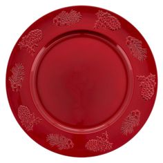 a red plate with pine cones and leaves on it