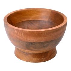 a wooden bowl sitting on top of a white surface