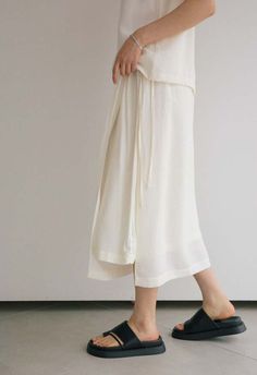 Sizes xs/s - l  color: white  midi length  ruched mesh top layer  side skirt split  string waist belt  61% polyester 23% linen 16% rayon  dry clean only  by the nkc store    product measurements:    waist: 66.04cm / 26in  length: 76.20cm / 30in Ruched Mesh Top, Mesh Top Layering, Easy Tiger, Caged Sandals, Black Tank Dress, Black Aviators, White Midi, Neon Purple, Boyfriend Tee