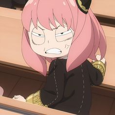 an anime character with pink hair and black clothes