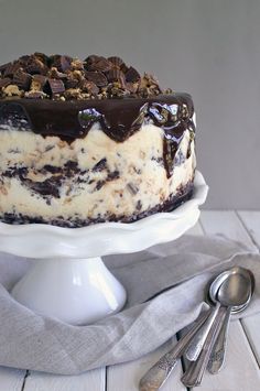 a cake with chocolate and white frosting on a plate