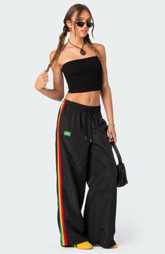 Unleash your sporty vibe in these modern track pants designed with colorful stripes racing down the sides. 100% polyester Machine wash, dry flat Imported Hiphop Girl Style, Hiphop Girl, Nylon Track Pants, Fancy Fits, Black Tube Top, Dance Outfits Practice, Top Strapless, Practice Outfits, Swimwear Dress