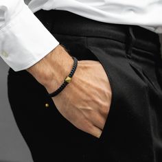 The golden pyramid centerpiece adds a touch of elegance and sophistication to the black wristband.  The adjustable design ensures a comfortable fit for wrists of all sizes, making it suitable for both men and women. Whether it's an anniversary celebration, a special occasion, or everyday wear, this bracelet adds a touch of sophistication to any outfit.  🎁 PERFECT GIFTS FOR MEN WOMEN - Genuine energy protection jewelry is a great gift for anyone interested in spiritual protection symbols or eye-catching bracelets. 📏 ADJUSTABLE CORD BRACELETS - This ultra-wearable multi-purpose bracelet is wrapped and can comfortably fit all wrist sizes. 🏷️ Details: * Handmade Item with Unique Design * Material: Nylon Cord, Stainless Steel with Zircon Diamond * Color: Black * Fastening: Slide lock * Finis Spiritual Protection Symbols, Golden Pyramid, Pyramid Bracelet, Protection Symbols, Energy Protection, Wrist Accessories, Protection Jewelry, Spiritual Protection, Birthday Gift For Him