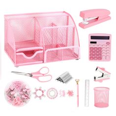 pink office supplies including scissors, pencils, and other items on a white background