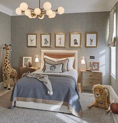 a bed room with a neatly made bed and stuffed animals