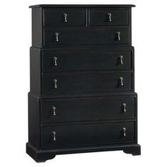 a tall black dresser with five drawers