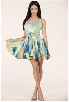 Tie-Dye Mini Dress features a surplice neckline and a flirty skater silhouette with a godet mini hem featuring a removable belt. -Enclosed Side Zipper -Adjustable Straps -Removable belt -100% Cotton, Contrast : 100% Cotton, Lining : 97% Polyester 3% Spandex Belted V-neck Mini Dress For Summer, Fitted Mini Dress With Belt For Summer, Summer Mini Dress With Belt, Belted Mini Dress For Summer, Summer V-neck Belted Mini Dress, Spring V-neck Belted Mini Dress, Belted Multicolor Mini Dress For Summer, Belted Blue Mini Dress For Summer, Blue Belted Mini Dress For Summer