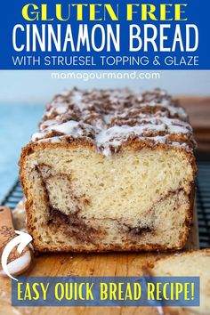 a loaf of cinnamon bread sitting on top of a wooden cutting board