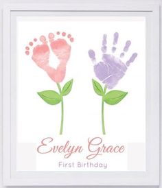 two handprints with the words evelyn grace first birthday and an image of a flower