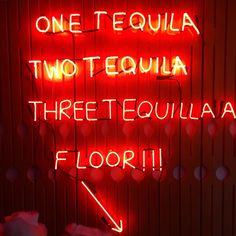 a neon sign that says, one tequila two tequila three tequila floor i love it