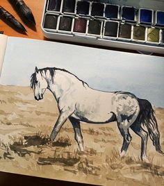 a drawing of a white horse standing in the desert with watercolor paints on it