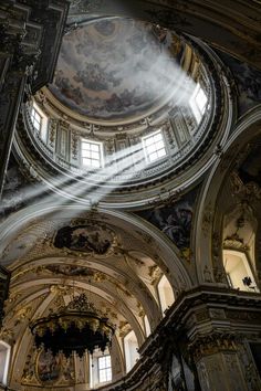 the inside of an old building with many windows