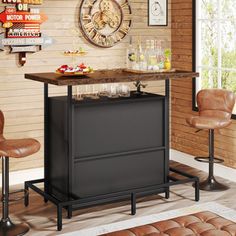 a bar with two stools and a clock on the wall behind it in a living room