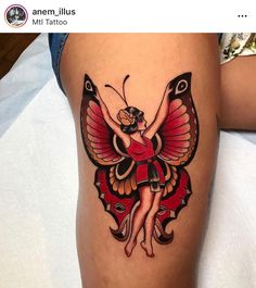 a woman with a butterfly tattoo on her thigh