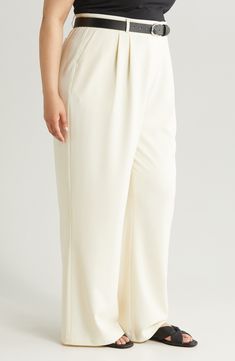 Soften your in-office look with flowy, wide-leg pants cut from a textured, seasonless blend and fronted with stitched-down pleats. 31" inseam; 30" leg opening; 14" front rise; 17" back rise (size 18) Zip fly with hook-and-bar closure Front slant pockets; back button-welt pockets 30% recycled polyester, 28% polyester, 37% viscose, 5% elastane Dry clean Imported Classic White Wide Leg Pants With Welt Pockets, Elegant Wide Leg Cream Pants With Elastic Waistband, Elegant Cream Wide Leg Pants With Elastic Waistband, Elegant Cream Wide Leg Pants With Pockets, Cream Ankle-length Wide Leg Pants For Formal Occasions, Formal Cream Wide Leg Ankle-length Pants, Formal Cream Ankle-length Wide Leg Pants, Beige Wide-leg Dress Pants With Welt Pockets, Cream Wide-leg Pants With Pressed Crease