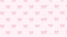 a pink background with small bows on it