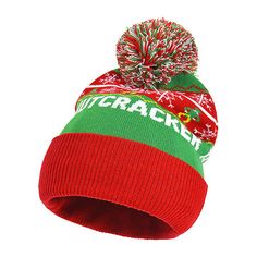 Get into the festive spirit with our Elf Intarsia Pom Cuff beanie, a must-have accessory for any holiday celebration. Made from high-quality acrylic and polyester material, this beanie is designed to keep you warm and cozy during the colder months.Featuring a classic green beanie with red stripes and white snowflakes, this beanie adds a touch of whimsy to your winter wardrobe. The playful pom-pom on top and the charming elf graphic on the front create a fun and unique look that's sure to turn he Red Novelty Winter Hats, Novelty Red Winter Hat, Casual Beanie Christmas Hats, Casual Christmas Beanie Hat, Green Beanie, Mens Beanie, White Snowflake, On The Shelf, Holiday Celebration