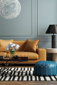 a living room filled with furniture and a large white ball hanging over the top of it