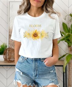 Sunflower - Sunflower Shirt, Floral Tee Shirt, Flower Shirt,Garden Shirt, Womens Fall Shirt, Sunflower Tshirt Sunflower Shirts. Sunshine Tee Most customers feel the shirts fit true to size, however, ladies should size down if you prefer a fitted look or if you have a petite body frame. The shirt is a relaxed /loose fit and will be slightly longer in body length and sleeve length. Please consult size chart within images. Sweatshirts are Bella + Canvas Unisex and super soft! They run true to size. Printed Summer Tops As A Gift, Graphic Tee Shirt As A Summer Gift, Trendy Custom Print Spring Shirt, Spring Gift Shirt With Custom Print, Spring Tops As Gifts, Floral Print Flower-shaped Tops For Mother's Day, Graphic Tee Tops For Spring, Spring Graphic Print Tops Gift, Plant Print Short Sleeve Tops