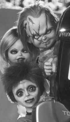 three children with creepy hair and makeup on