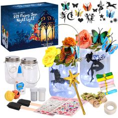 an assortment of crafting supplies including mason jars and fairy lights are shown in front of a box