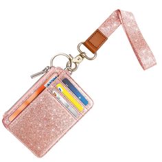 PRICES MAY VARY. Fashion cute glitter bling design, classic and chic glitter pink rose gold elements. unique design, simple but fashionable, good match to everyday use. The bright print augment the classic look, the design can go with any outfit and even it looks wonderful on your bare skin. 1 x Wrist lanyard, wallet holder with 6 x card slots, 1 x ID window, 1 x finger groove,1 x zipper pocket for money/bills. Easily holds your ID, Name Badge, Badge Holder, Cards, Money and Bills. Cute wrist la Pink Card Holder With Interior Key Chain As Gift, Pink Wallets With Interior Card Slots For Personal Use, Pink Wallets With Interior Card Slots, Pink Coin Purse With Card Slots For Personal Use, Daily Use Pink Wristlet With Cell Phone Pocket, Pink Card Holder With Card Slots For Daily Use, Rectangular Pink Badge Holders For Everyday Use, Pink Lanyard, Wallet Lanyard