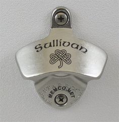 a metal object with the word sulllion on it's side and a celtic knot at the top