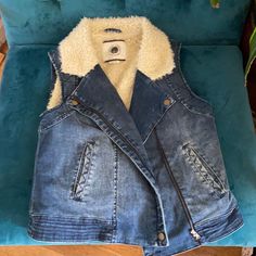 Daughters Of The Liberation - Anthropologie - Sherpa Lined Denim Vest. Zip Front With Pockets On Both Sides. Size Small - New Never Worn - Sherpa Lined Denim Vest, Winter Denim Vest In Medium Wash, Fitted Denim Vest For Winter, Trendy Dark Wash Denim Vest For Winter, Trendy Denim Blue Winter Vest, Fitted Denim Blue Winter Vest, Fitted Denim Blue Vest For Winter, Anthropologie Sherpa, Anthropologie Jacket