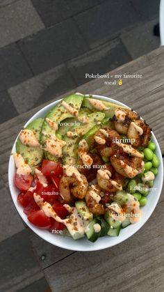 a white bowl filled with different types of food