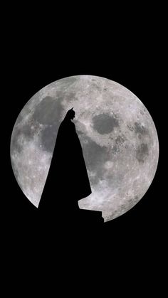 the silhouette of a person standing in front of a full moon