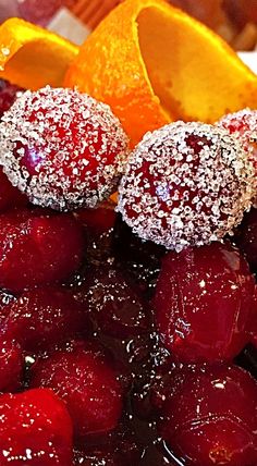 a close up of fruit with powdered sugar on top