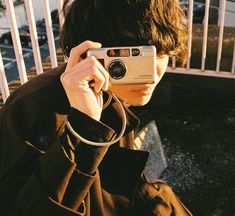 a person taking a photo with a camera