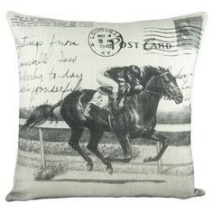 a pillow with a horse and jockey on it