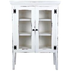 an old white cabinet with glass doors and black knobs on the bottom, against a white background