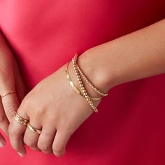 Elegant with a touch of whimsy, our Bubble Bracelets are the quintessential MB style. Each 7-inch bracelet features shiny 4mm hollow 14k yellow gold beads that connect with a lobster clasp. Wear it alone, or mix and match with other bracelets for a one-of-a-kind arm party. In stock bracelets will ship within 3 business days Made to order bracelets ship within 1 week. Need it sooner? Contact us. Details 4mm hollow 14k beads Approximately 7" Lobster Clasp Shipping + Returns In stock bracelets sets Arm Party Bracelets, Bubble Bracelet, Bracelets Sets, Arm Party, Gold Beads, Mix And Match, Bracelet Set, Lobster Clasp, Bubbles