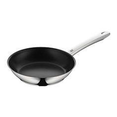 an empty frying pan on a white background with a spoon in the foreground