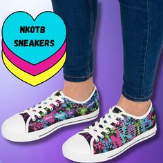 a woman's feet wearing colorful sneakers with the words not b sneakers on them