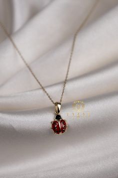 "ABOUT PRODUCT This 14K Gold  Ladybug necklace is beautifully designed and hand crafted with our associates to make this a special gift for your loved ones. Knowing the value of our customers, We prepare each piece with extra care and attention. ITEM DETAILS Material: 14K Gold Approx: 2.20 gr  Only Pendant: 1.30 gr Available colors: Gold, Rose Gold, White Gold Available Sizes: 14\" to 20\" ✪ 14k Solid Gold ( Certification will be included with your order ) ✪Available 14K White, Yellow, Rose Gold 14k Gold Oval Pendant Charm Necklace For Gift, 14k Gold Jewelry With Lobster Clasp For Gift, Red Sterling Silver Jewelry For Mom, Red Sterling Silver Jewelry As Gift For Mom, 14k Gold Oval Necklace For Gift, Oval 14k Gold Necklace For Gift, Dainty Jewelry With Lobster Clasp For Gift, Oval Charm Necklace With Adjustable Chain As Gift, Oval Charm Necklaces With Adjustable Chain As Gift